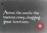 Image of British howitzers pulled by tractor Palestine, 1918, second 1 stock footage video 65675029255