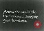 Image of British howitzers pulled by tractor Palestine, 1918, second 3 stock footage video 65675029255