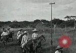 Image of Mexican Federal cavalry and army forces march on plains Veracruz Mexico, 1914, second 44 stock footage video 65675029261