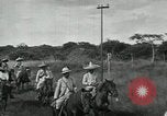 Image of Mexican Federal cavalry and army forces march on plains Veracruz Mexico, 1914, second 45 stock footage video 65675029261