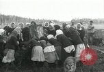 Image of Russian women work removing stumps Archangel Russia, 1918, second 39 stock footage video 65675029280