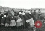 Image of Russian women work removing stumps Archangel Russia, 1918, second 40 stock footage video 65675029280