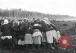 Image of Russian women work removing stumps Archangel Russia, 1918, second 46 stock footage video 65675029280