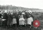 Image of Russian women work removing stumps Archangel Russia, 1918, second 48 stock footage video 65675029280