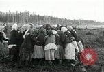 Image of Russian women work removing stumps Archangel Russia, 1918, second 49 stock footage video 65675029280