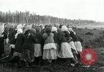 Image of Russian women work removing stumps Archangel Russia, 1918, second 50 stock footage video 65675029280