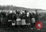 Image of Russian women work removing stumps Archangel Russia, 1918, second 55 stock footage video 65675029280