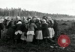 Image of Russian women work removing stumps Archangel Russia, 1918, second 56 stock footage video 65675029280