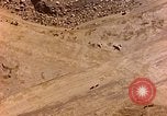 Image of shoreline Iwo Jima, 1945, second 7 stock footage video 65675029313