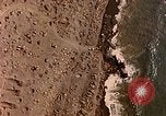 Image of shoreline Iwo Jima, 1945, second 18 stock footage video 65675029313