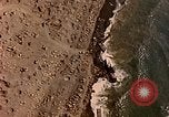 Image of shoreline Iwo Jima, 1945, second 19 stock footage video 65675029313