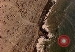Image of shoreline Iwo Jima, 1945, second 20 stock footage video 65675029313