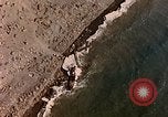 Image of shoreline Iwo Jima, 1945, second 24 stock footage video 65675029313