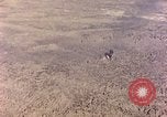 Image of shoreline Iwo Jima, 1945, second 25 stock footage video 65675029313