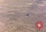 Image of shoreline Iwo Jima, 1945, second 26 stock footage video 65675029313