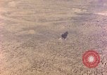 Image of shoreline Iwo Jima, 1945, second 31 stock footage video 65675029313