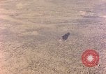 Image of shoreline Iwo Jima, 1945, second 34 stock footage video 65675029313