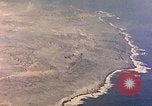 Image of shoreline Iwo Jima, 1945, second 35 stock footage video 65675029313