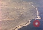 Image of shoreline Iwo Jima, 1945, second 37 stock footage video 65675029313