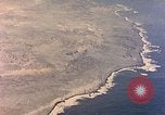 Image of shoreline Iwo Jima, 1945, second 38 stock footage video 65675029313