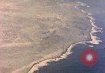 Image of shoreline Iwo Jima, 1945, second 39 stock footage video 65675029313