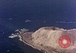 Image of shoreline Iwo Jima, 1945, second 42 stock footage video 65675029313