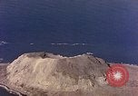 Image of shoreline Iwo Jima, 1945, second 44 stock footage video 65675029313