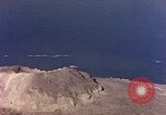 Image of shoreline Iwo Jima, 1945, second 45 stock footage video 65675029313