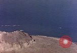 Image of shoreline Iwo Jima, 1945, second 46 stock footage video 65675029313