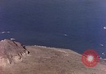 Image of shoreline Iwo Jima, 1945, second 47 stock footage video 65675029313