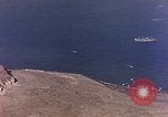 Image of shoreline Iwo Jima, 1945, second 48 stock footage video 65675029313