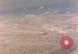 Image of shoreline Iwo Jima, 1945, second 53 stock footage video 65675029313