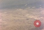 Image of shoreline Iwo Jima, 1945, second 54 stock footage video 65675029313