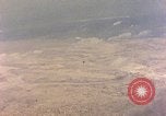 Image of shoreline Iwo Jima, 1945, second 55 stock footage video 65675029313