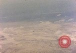 Image of shoreline Iwo Jima, 1945, second 56 stock footage video 65675029313