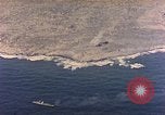Image of shoreline Iwo Jima, 1945, second 59 stock footage video 65675029313
