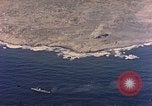 Image of shoreline Iwo Jima, 1945, second 60 stock footage video 65675029313