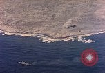 Image of shoreline Iwo Jima, 1945, second 61 stock footage video 65675029313