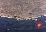Image of shoreline Iwo Jima, 1945, second 62 stock footage video 65675029313