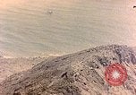 Image of volcano crater Iwo Jima, 1945, second 1 stock footage video 65675029314