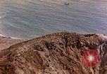 Image of volcano crater Iwo Jima, 1945, second 5 stock footage video 65675029314