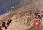Image of volcano crater Iwo Jima, 1945, second 9 stock footage video 65675029314