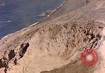 Image of volcano crater Iwo Jima, 1945, second 10 stock footage video 65675029314