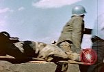 Image of Wounded US Marines on D-Day of Iwo Jima Iwo Jima, 1945, second 22 stock footage video 65675029319