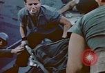 Image of Iwo Jima casualties brought to LST Iwo Jima, 1945, second 51 stock footage video 65675029320