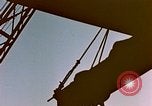 Image of Iwo Jima wounded hoisted onto LST Iwo Jima, 1945, second 4 stock footage video 65675029321