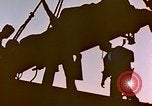 Image of Iwo Jima wounded hoisted onto LST Iwo Jima, 1945, second 8 stock footage video 65675029321