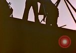 Image of Iwo Jima wounded hoisted onto LST Iwo Jima, 1945, second 10 stock footage video 65675029321