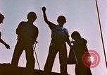 Image of Iwo Jima wounded hoisted onto LST Iwo Jima, 1945, second 18 stock footage video 65675029321