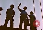 Image of Iwo Jima wounded hoisted onto LST Iwo Jima, 1945, second 19 stock footage video 65675029321